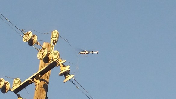 Electric chopper over East Oakland